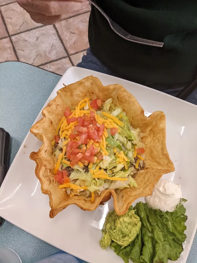 Two Chalupes Cone Chicken One Ground Beer Lopped with Shredded Lettuce Tomatoes & Chees